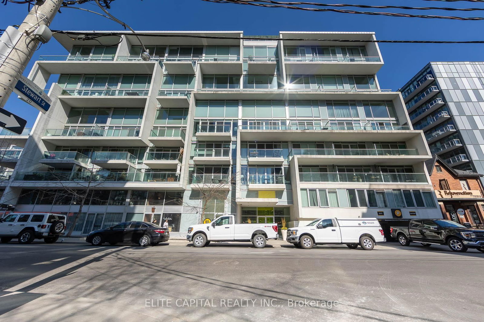 Welcome to prime living in the heart of the Fashion District! This stunning, open-concept loft combines modern design with unbeatable convenience. Enjoy floor-to-ceiling windows and soaring 9-foot concrete ceilings that fill the space with natural light. Freshly painted and updated with new light fixtures, this loft boasts a sleek, modern kitchen with an oversized breakfast bar, perfect for entertaining. The spacious den offers an ideal setup for a home office, while hardwood floors run throughout the loft, adding warmth and style. The primary suite includes a 4-piece ensuite bath and a generous walk-in closet, ensuring ample storage. Plus, the large parking spot provides added convenience. Just steps from public transit and surrounded by the trendiest bars and restaurants, this loft offers the ultimate city lifestyle!