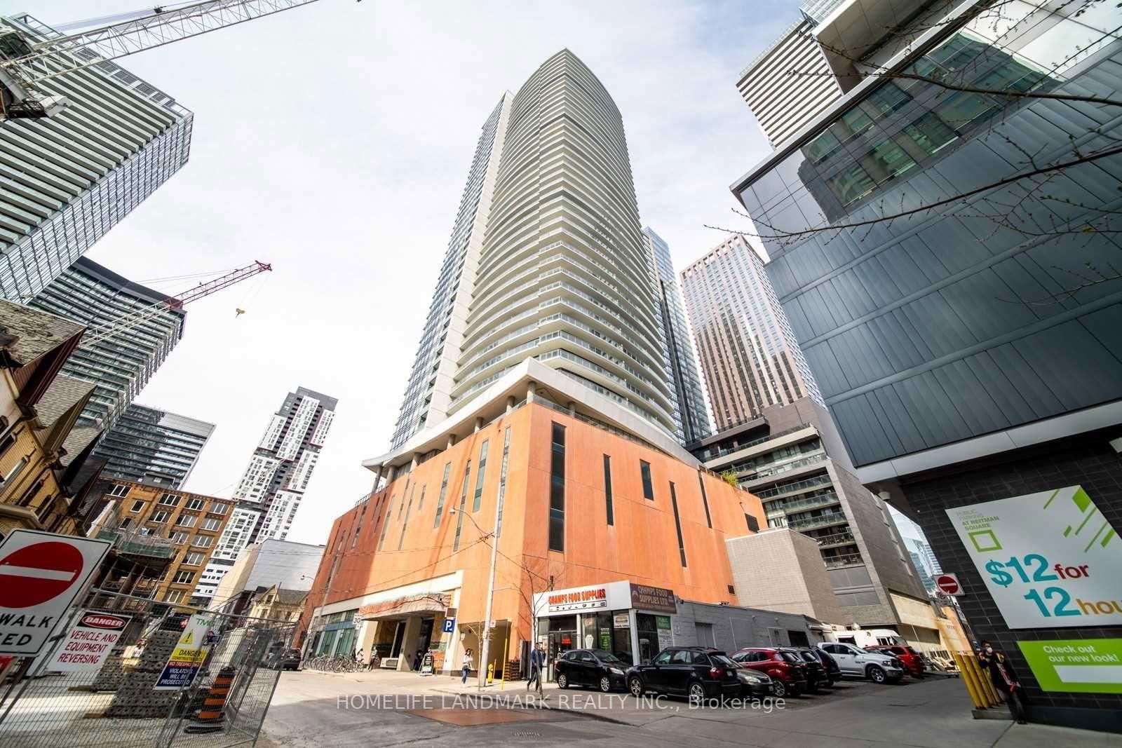 Welcome To The Cinema Tower! Turn Key Condo Featuring 1 Plus Den With 2 Full Bathrooms. Enjoy A Cup Of Coffee On Your Large 135Sf Private Balcony Overlooking The City Skyline From The 25th Floor. Resort Style Amenities Incl: Basketball Court, Theatre, Rooftop Deck, Gym, Concierge, Party Room. Steps From Everything Toronto Has To Offer Incl: Transit, Bars, Restaurants, Grocery Stores. 1 Parking/1 Locker Included!