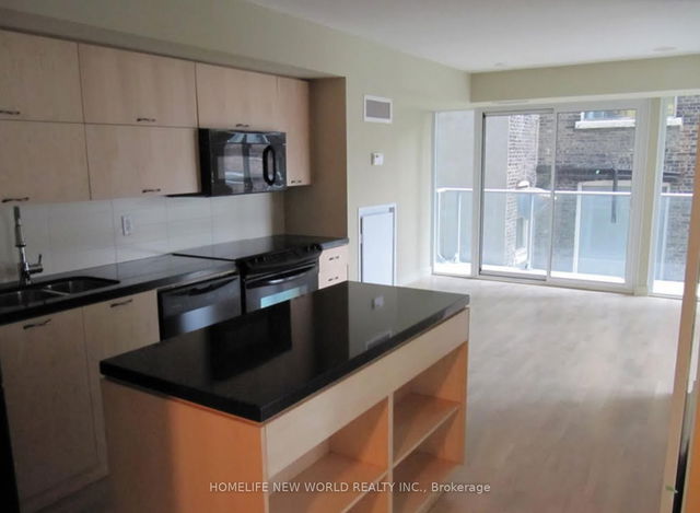 303 - 126 Simcoe Street
