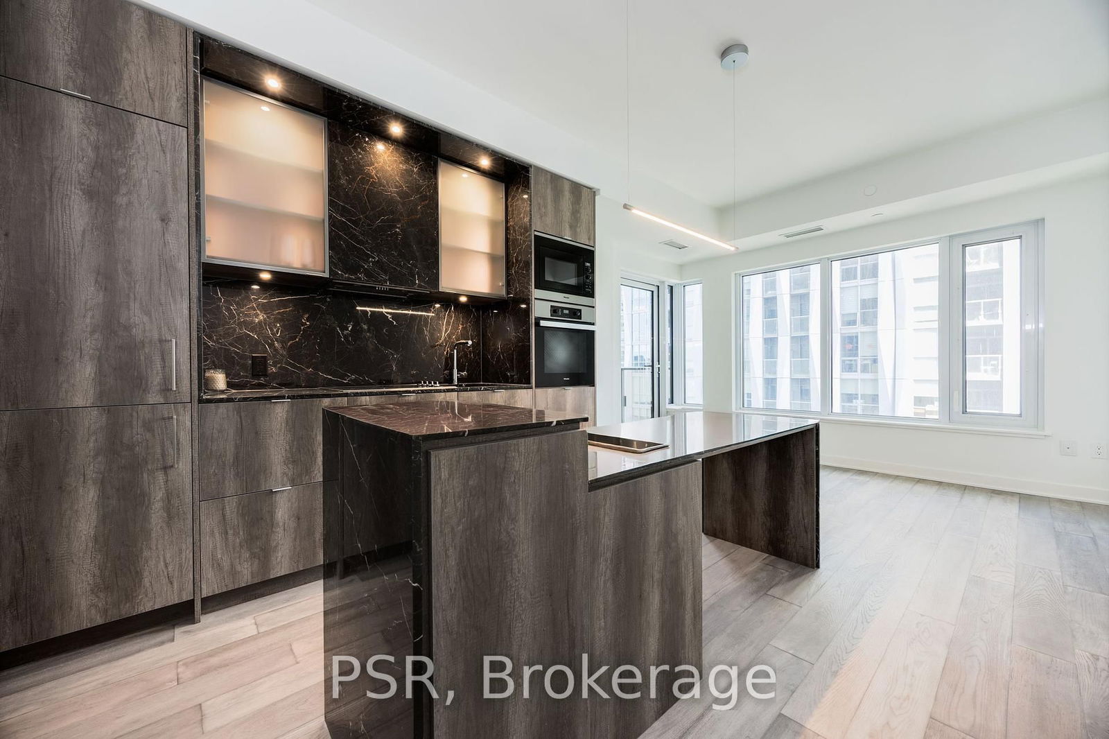 Welcome to 11 Yorkville Avenue- an iconic address nestled in one of Toronto's most prestigious neighbourhoods. This brand-new, never-lived-in one bedroom plus media suite offers a spacious and thoughtfully designed layout, highlighted by 9-foot ceilings and engineered hardwood flooring throughout. The sleek open-concept kitchen features top-of-the-line integrated Miele appliances and an island featuring built-in wine fridge. Enjoy ultimate luxury living with an impressive array of resort-style amenities (some currently under construction), including 24-hour concierge, state-of-the-art fitness facilities, rooftop terrace, indoor & outdoor pools, guest suites, and more. Perfectly situated at Yonge & Bloor, you're steps away from two subway lines, world-class shopping, fine dining, cozy cafés, leading institutions, and cultural landmarks. An extraordinary opportunity to call Yorkville home!