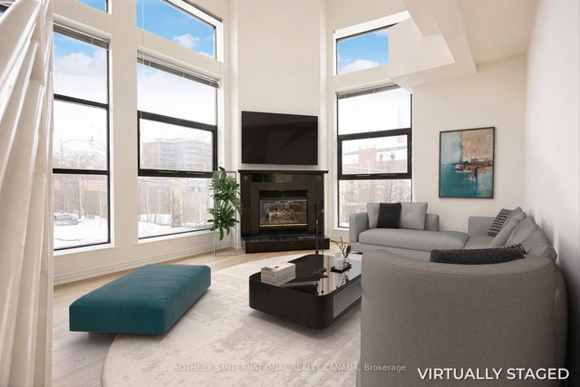 202 - 393 King Street E