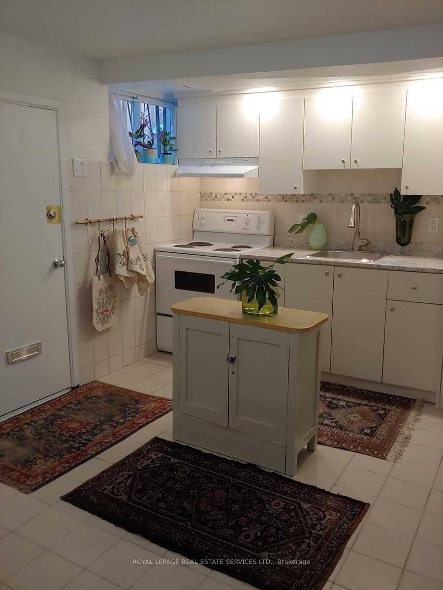 Semi-Detached House for lease at Lower Level-1239 College Street, Toronto, Ontario, M6H 1C3 - Little Portugal - MLS: C12854552