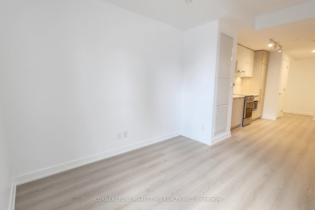 303 - 100 Queen Street E