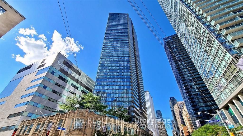 The Burono Luxury Condominium On Bay Street. Unobstructed South East View Of Queens Park, City and Lake Ontario! Upgraded Kitchen/Baths, Wood Floors, Granite Counters, S/S Appliances, High 9' Ceilings + Balcony!! Bright Spacious 2 Bedroom & 2 Bath Corner Unit, Steps To Subway, Univisity Of Toronto, Queens Park, Hospital, Shopping And Finest Amenities.