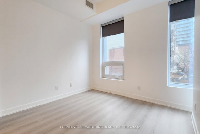 301 - 100 Queen Street E