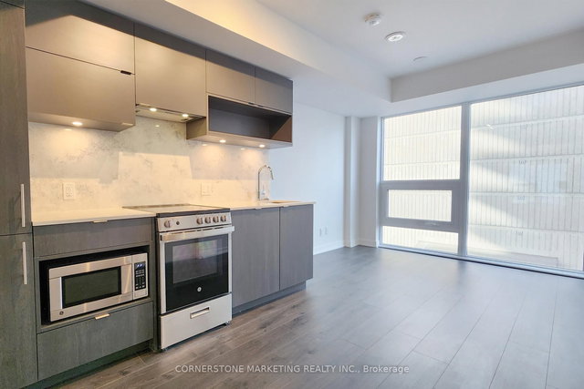 715 - 100 Queen Street E