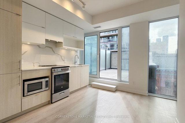 608 - 100 Queen Street E