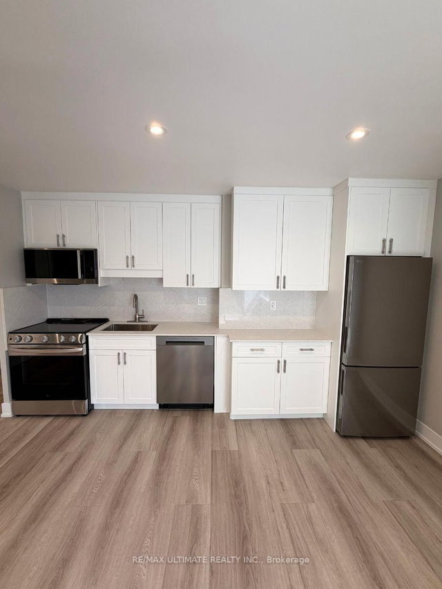 303 - 699 Balliol Street