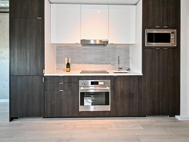 418 - 21 Lawren Harris Sq, Toronto, M5A 1H7 | Image 3
