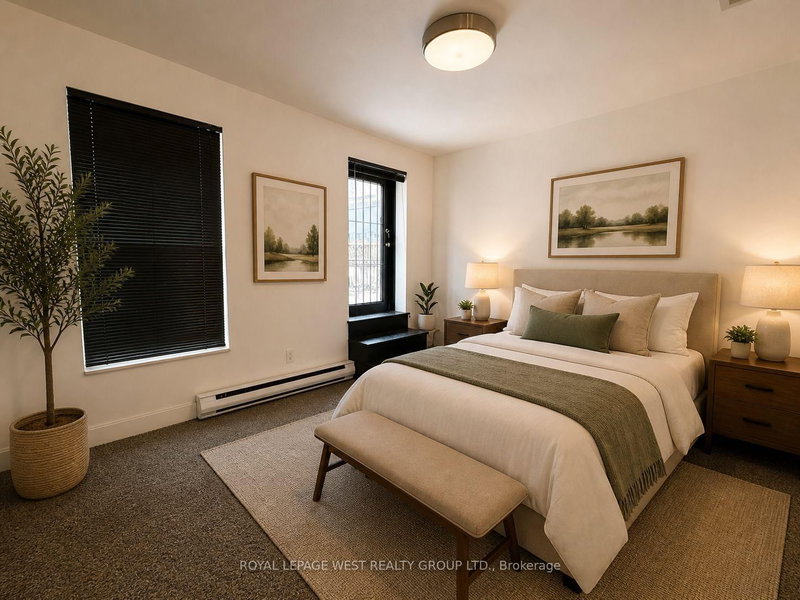 3 - 261 Queen Street W