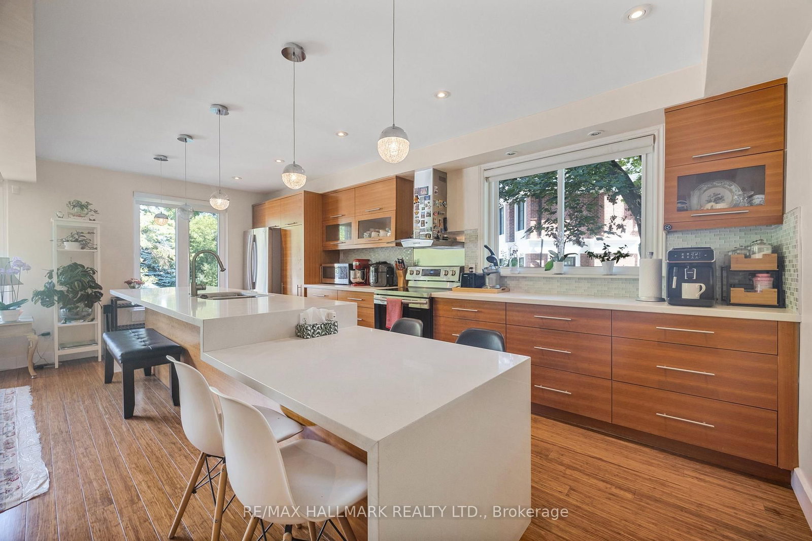 Wood cabinets and white stone counters
