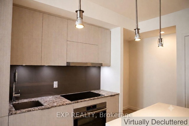 2011 - 1 Bloor Street E