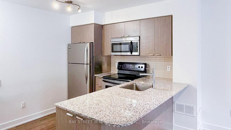 402 - 23 Sheppard Avenue E