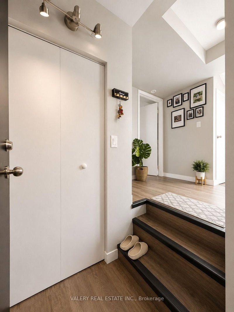 8 - 205 Gerrard Street E
