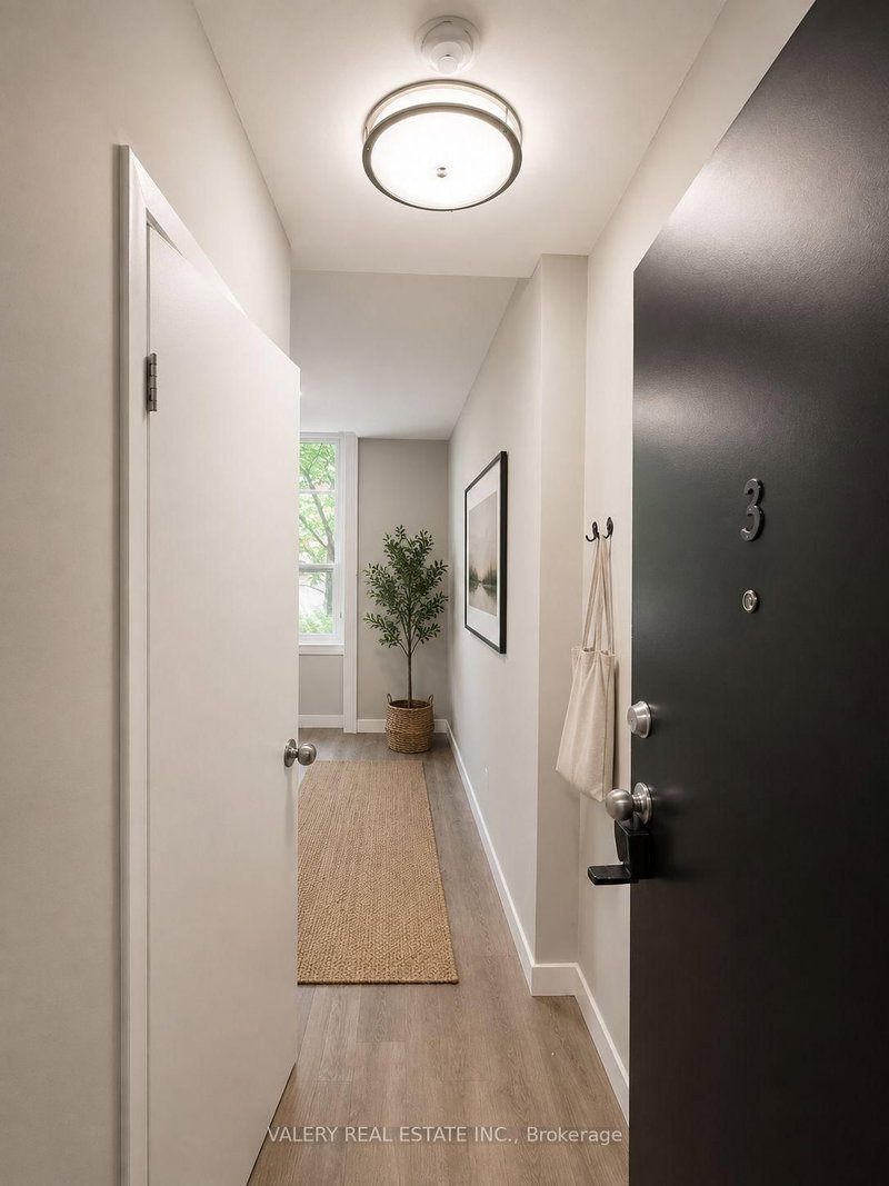 3 - 205 Gerrard Street E
