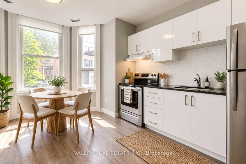 4 - 205 Gerrard Street E