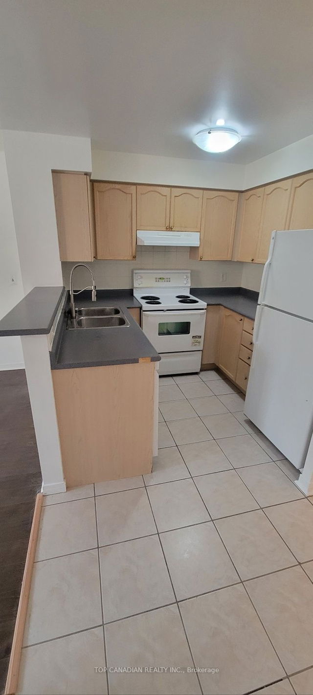 303 - 20 Olive Avenue