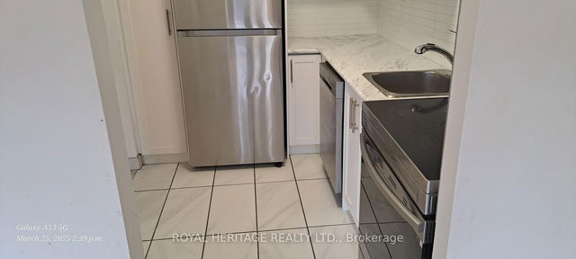 101 - 945 Simcoe Street