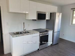 Upper 3 - 719 Coxwell Avenue