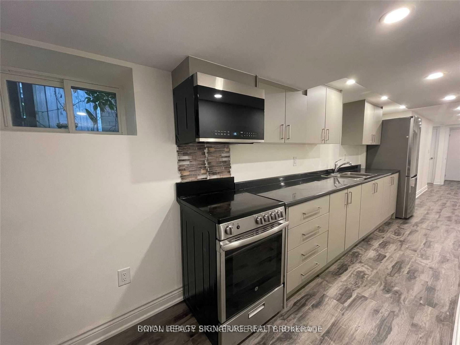 Detached House for lease at Lower-20 Kew Beach Avenue, Toronto, Ontario, M4L 1B7 - The Beaches - MLS: E12769198