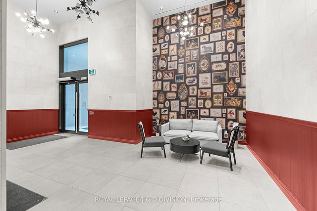 301 - 665 Queen Street E