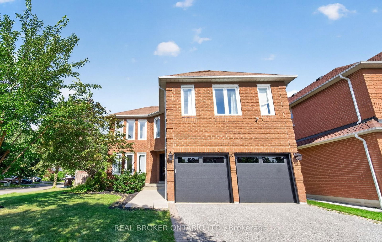 63 Eric Clarke Drive • Whitby, ON photo 1