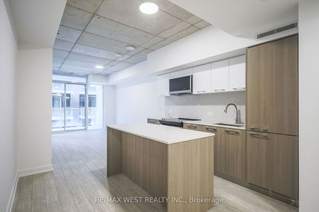 303 - 665 QUEEN Street