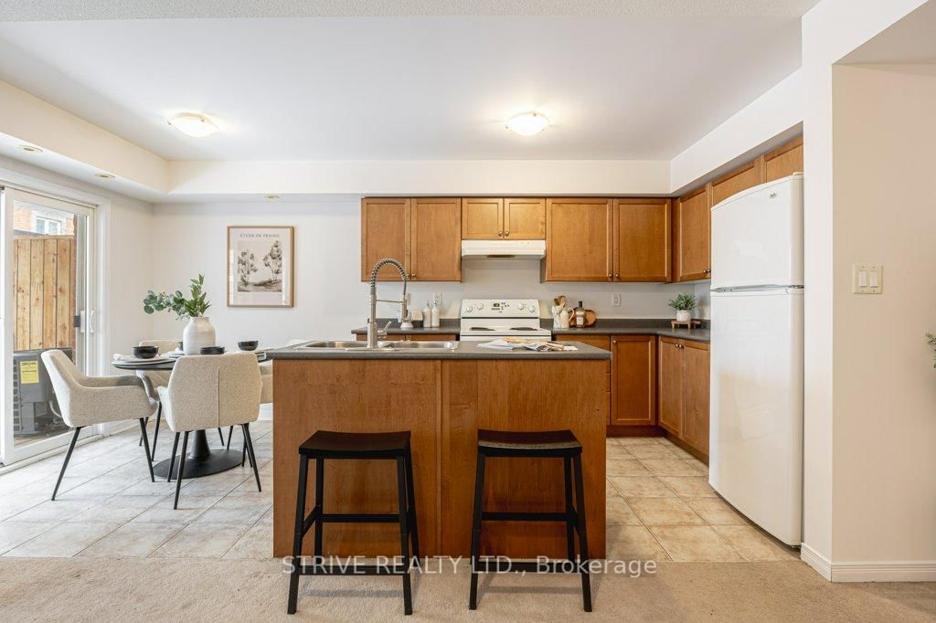 Townhouse sold at 148 Louisbourg Way, Markham, Ontario, L6E 0C3 - Greensborough - MLS: N12681714