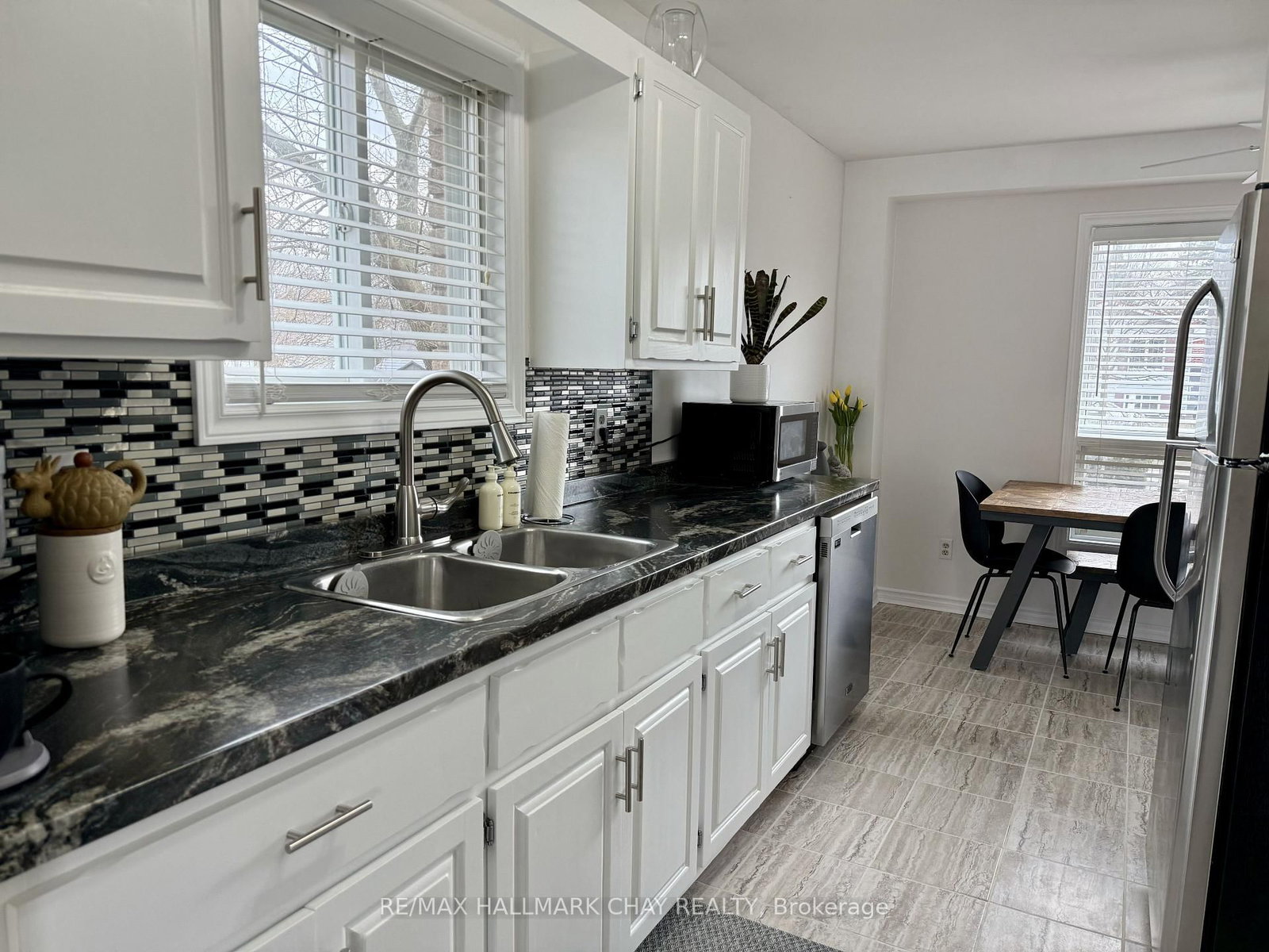 Townhouse for sale at 60 Osborn Street, Essa, Ontario, L0M 1B0 - Angus - MLS: N12943810