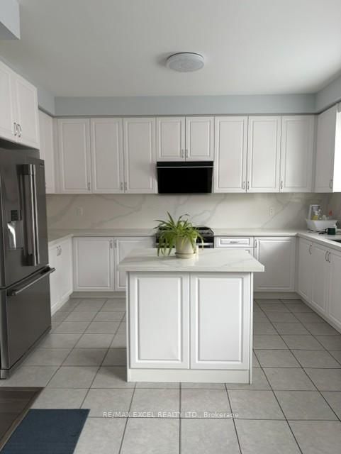 Townhouse for sale at 27 Spiv Grove Way, Markham, Ontario, L6E 0T6 - Greensborough - MLS: N12999412