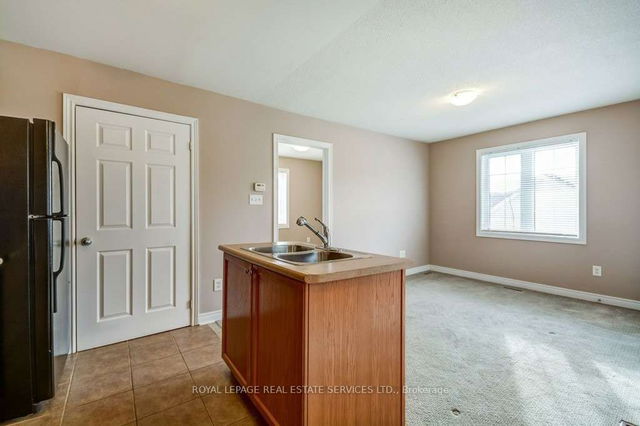 Coach - 49 Innisvale Drive