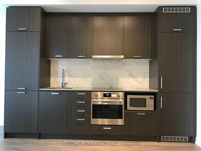 Unit 710 — 38 Honeycrisp Cres, Vaughan - Vaughan Corporate Centre image-0-2