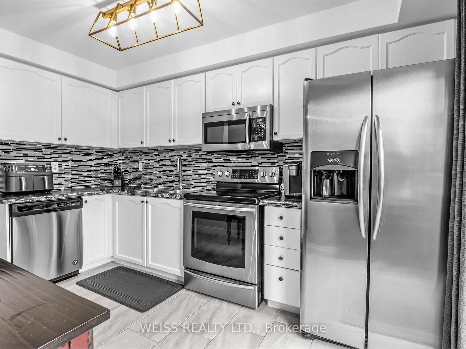 Townhouse for sale at 12 Sunset Place, Barrie, Ontario, L4N 0T7 - Holly - MLS: S12999660