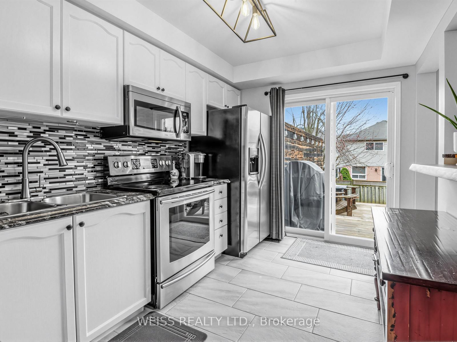 Townhouse for sale at 12 Sunset Place, Barrie, Ontario, L4N 0T7 - Holly - MLS: S12999660