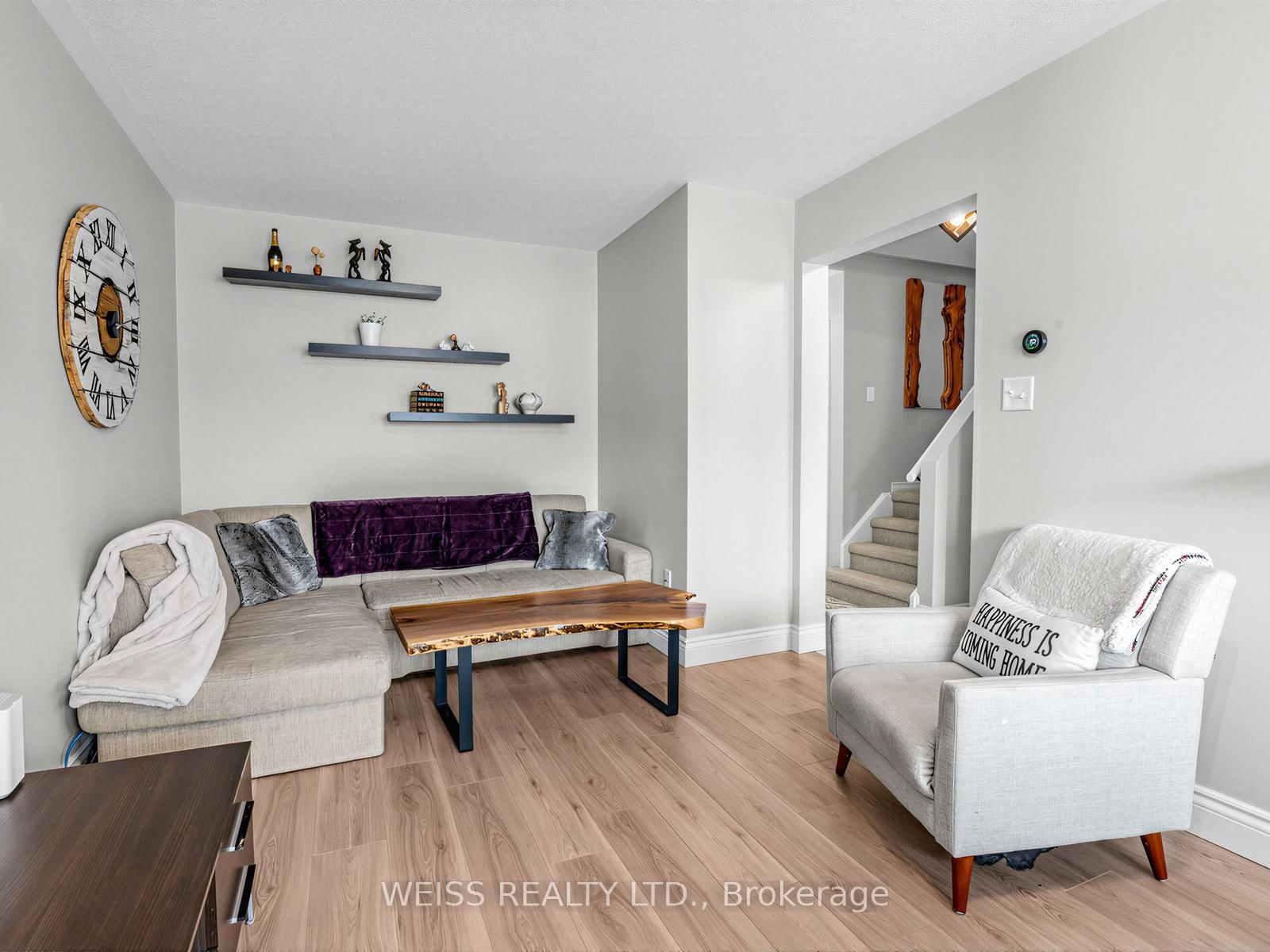 Townhouse for sale at 12 Sunset Place, Barrie, Ontario, L4N 0T7 - Holly - MLS: S12999660