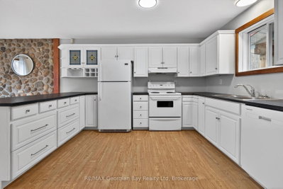 90 Farlain Lake Road W • Tiny, ON photo 3