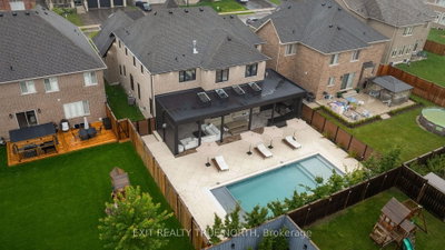 106 Rugman Crescent • Springwater, ON photo 2
