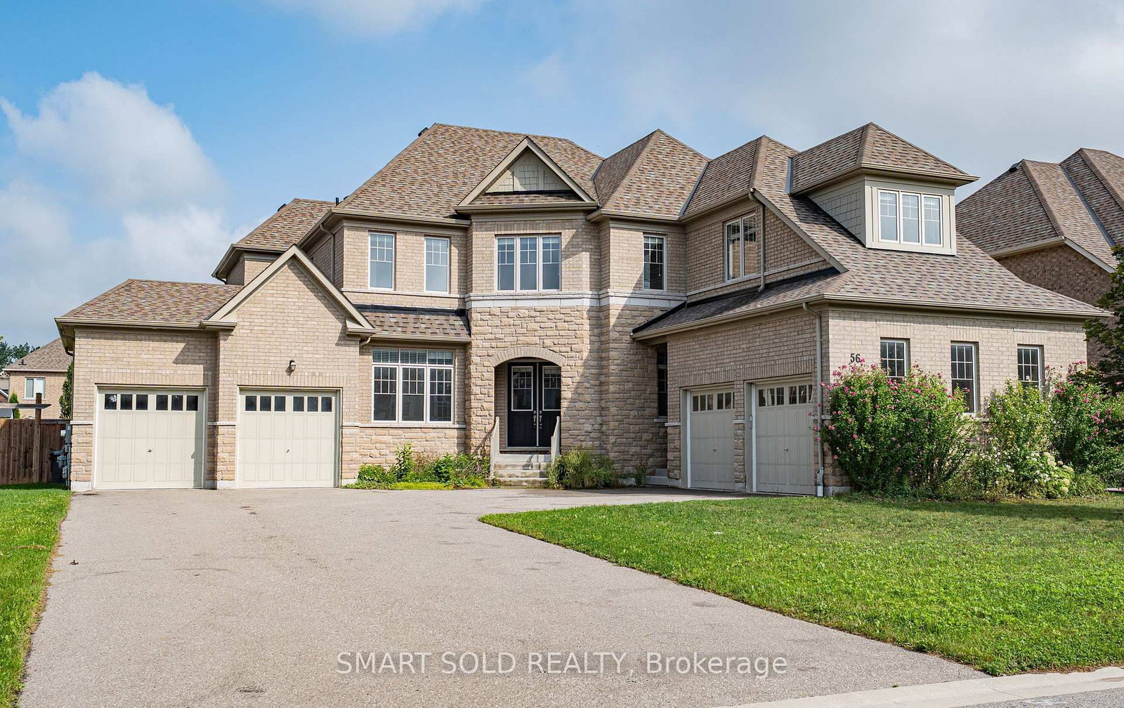 56 Redmond Crescent • Springwater, ON photo 1