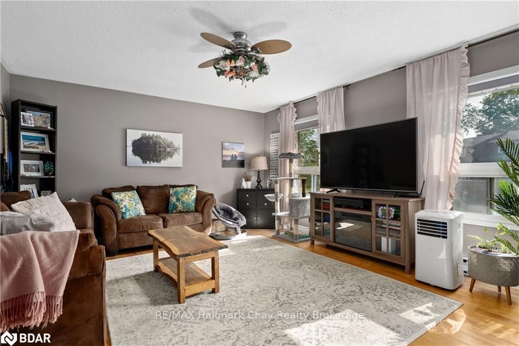 Townhouse sold at 33-360 Blake Street, Barrie, Ontario, L4M 1L3 - Codrington - MLS: S6311908