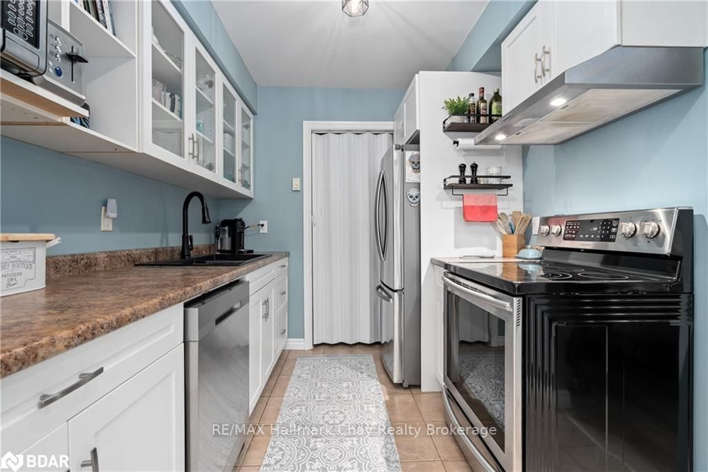 Townhouse sold at 33-360 Blake Street, Barrie, Ontario, L4M 1L3 - Codrington - MLS: S6311908