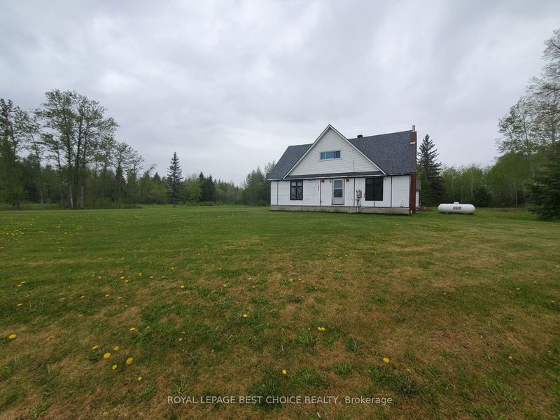 home for sale on 336042 Highway 11