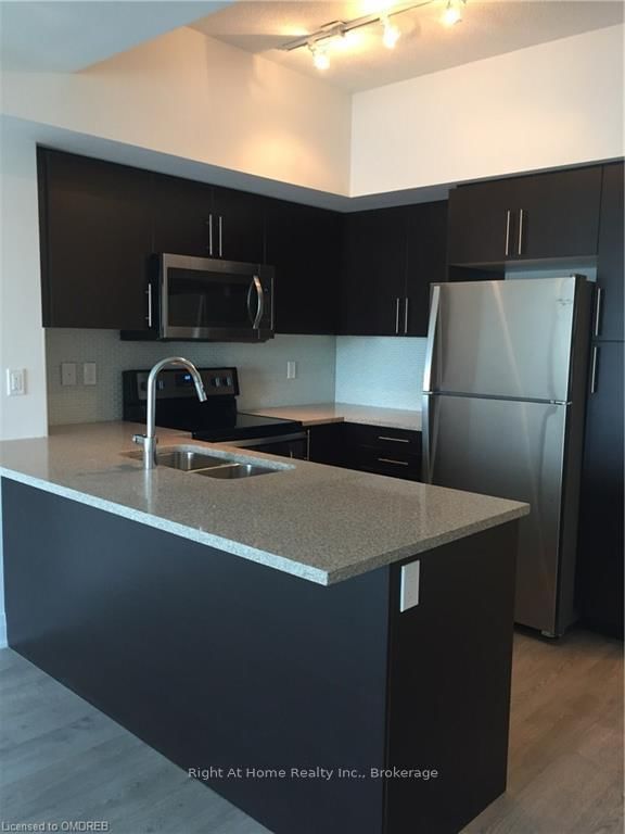 410 - 55 Speers Rd, Oakville, L6K 3R6 | Image 3