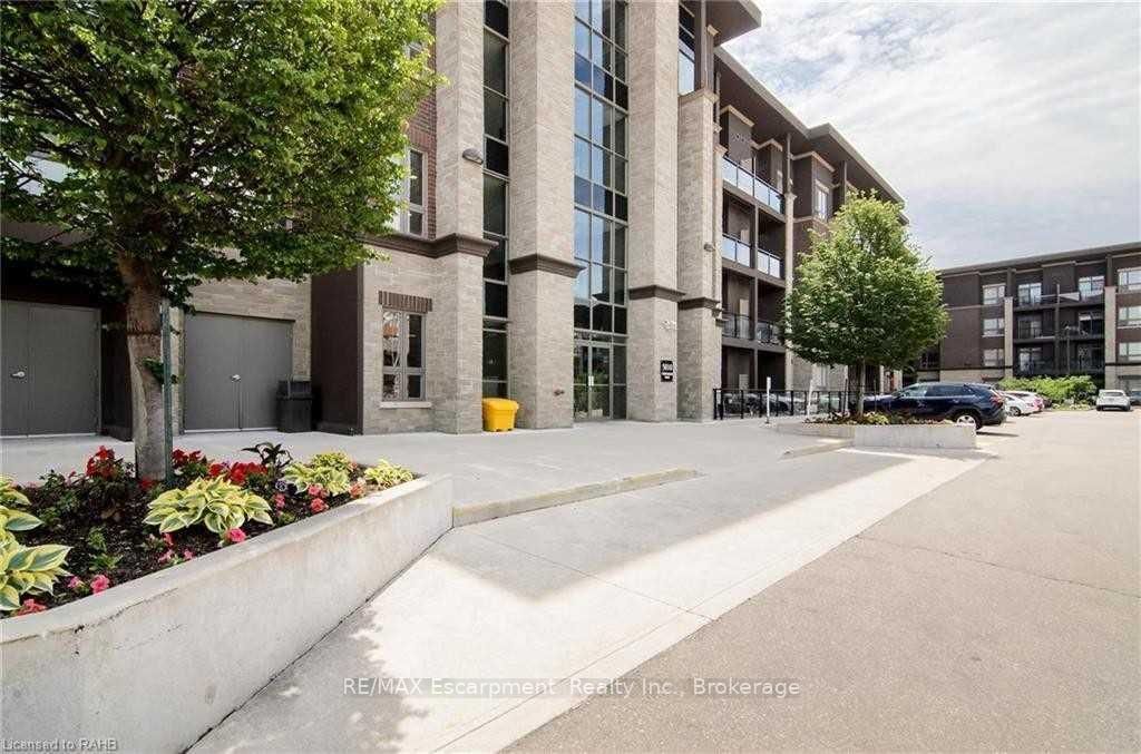 Condo for sale at 313-5010 Corporate Drive, Burlington, Uptown, L7L 0H6 - MLS: W11987186