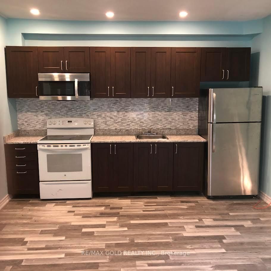 Semi-Detached House leased at 125 Queens Avenue, Toronto, Mimico, M8V 3X3 - MLS: W12049671