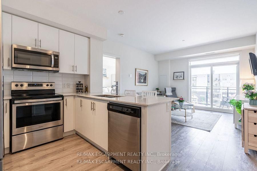 Condo sold at 512-340 Plains Road, Burlington, LaSalle, L7T 0C2 - MLS: W12059892