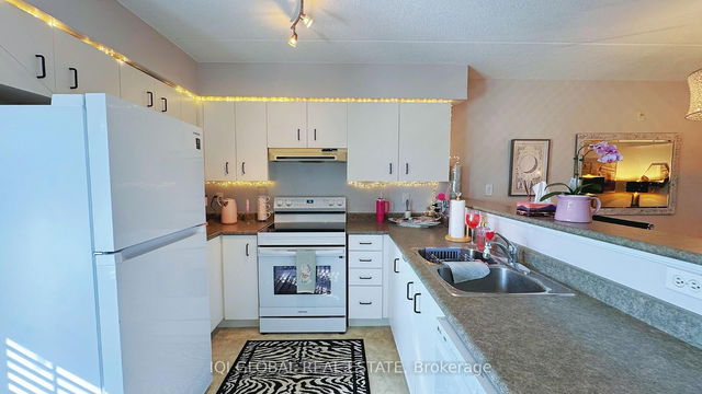 110 - 1490 Bishops Gate