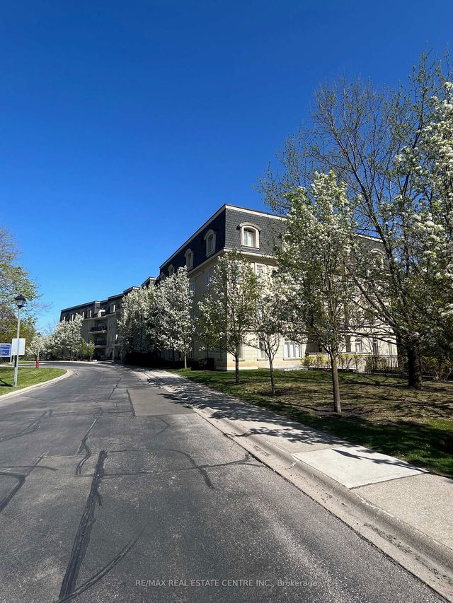 303 - 443 Centennial Forest Drive