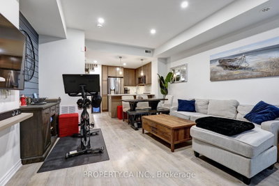 Townhouse leased at 8-100 Long Branch Avenue, Toronto, Ontario, M8W 0C1 - Long Branch - MLS: W12270019