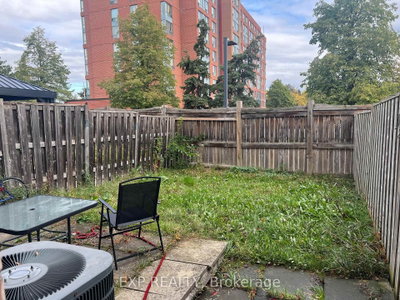Unit 13 — 7035 Rexwood Road — photo 2