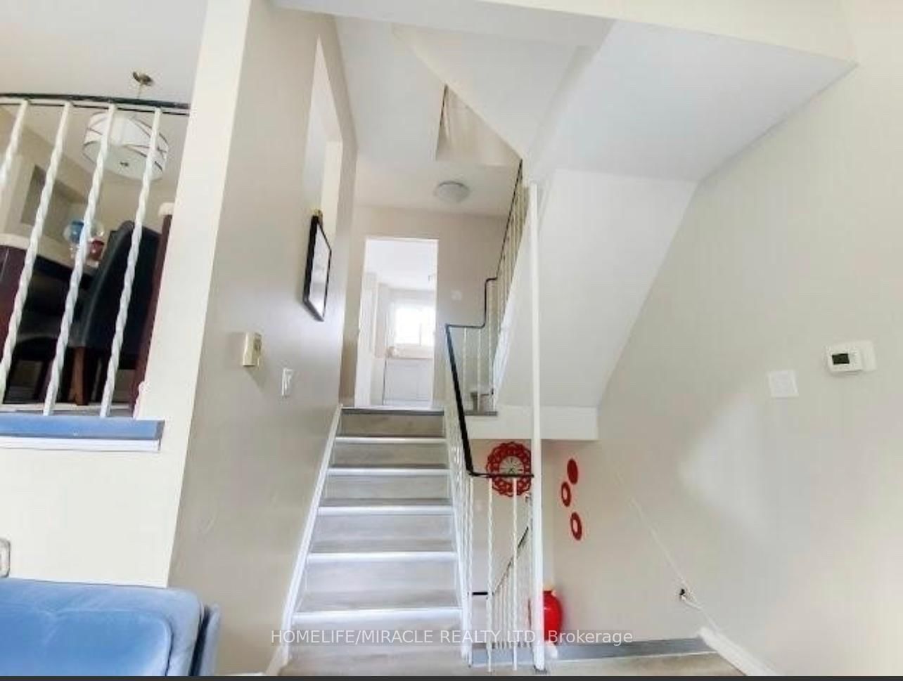 Townhouse for sale at 23 Mccallum Court, Brampton, Ontario, L6W 3M4 - Queen Street Corridor - MLS: W12796002